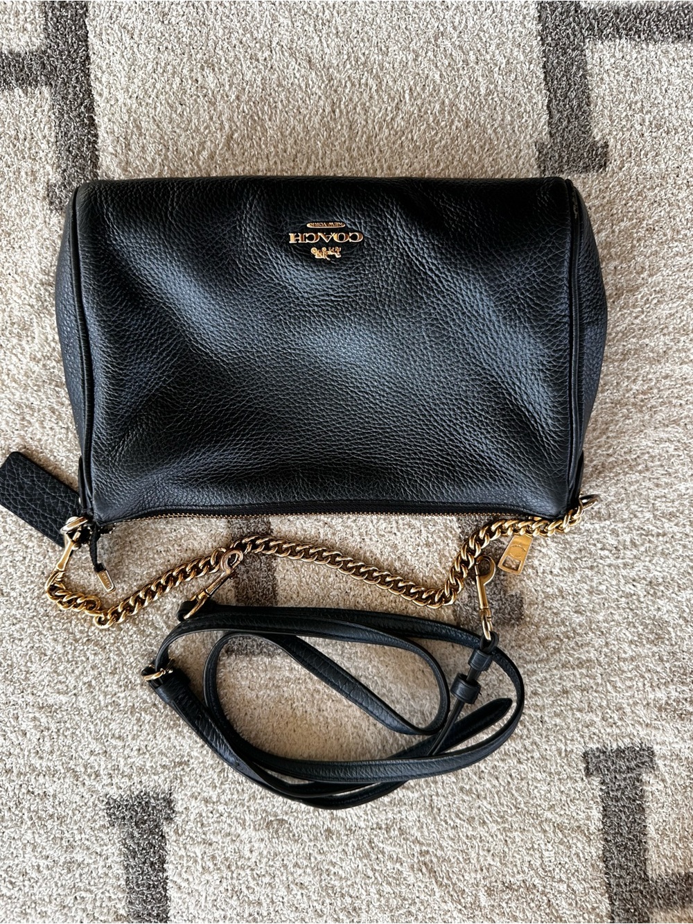 Dark blue coach crossover bag